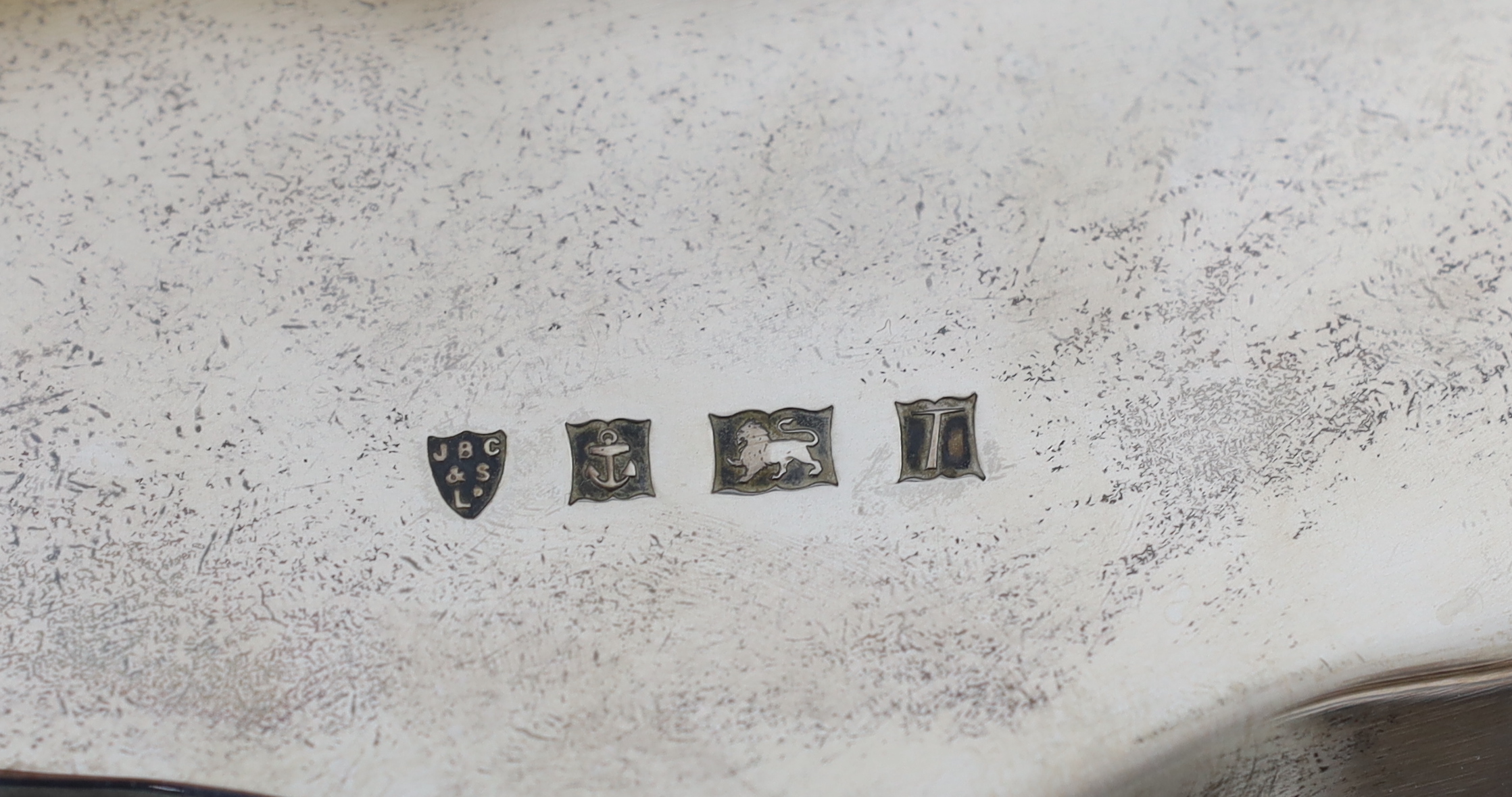 A Far Eastern white metal oval tray, with gadrooned and beaded rim, stamped silver, 45cm